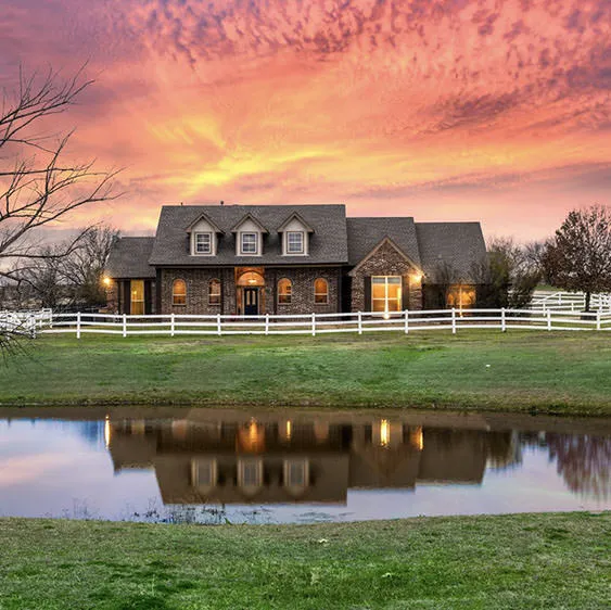 Texas ranch property captured at twilight with dramatic sky
